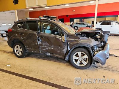 Czwarte zdjęcie samochodu z boku: 2014 TOYOTA RAV4 XLE VIN:JTMRFREVXED071706 - miniatura