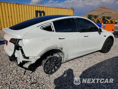 Trzecie zdjęcie samochodu z tyłu: 2023 TESLA MODEL Y VIN:7SAYGDEE7PF696395 - miniatura