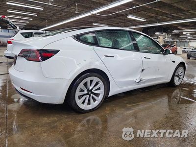 Trzecie zdjęcie samochodu z tyłu: 2022 TESLA MODEL 3 VIN:5YJ3E1EA4NF304799 - miniatura