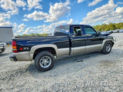 Trzecie zdjęcie samochodu z tyłu: 2002 GMC NEW SIERRA K1500 VIN:2GTEK19T121423115 - miniatura