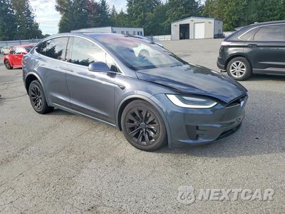 Czwarte zdjęcie samochodu z boku: 2016 TESLA MODEL X VIN:5YJXCDE25GF026466 - miniatura