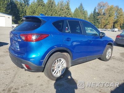 Trzecie zdjęcie samochodu z tyłu: 2014 MAZDA CX-5 TOURING VIN:JM3KE4CY7E0324211 - miniatura