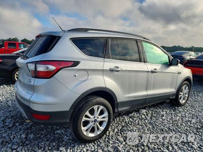 Trzecie zdjęcie samochodu z tyłu: 2018 FORD ESCAPE SE VIN:1FMCU9GD9JUA50318 - miniatura