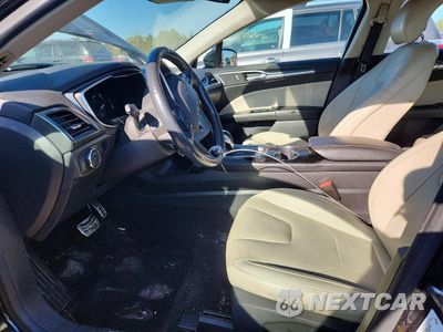 Zdjęcie 7 z 13 samochodu: 2014 FORD FUSION TITANIUM VIN:3FA6P0K93ER297988 - miniatura