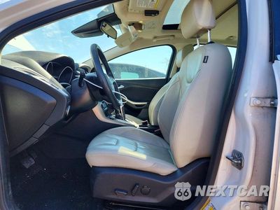 Zdjęcie 7 z 12 samochodu: 2017 FORD FOCUS TITANIUM VIN:1FADP3N25HL230822 - miniatura