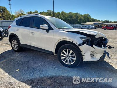 Czwarte zdjęcie samochodu z boku: 2016 MAZDA CX-5 TOURING VIN:JM3KE4CY0G0897986 - miniatura