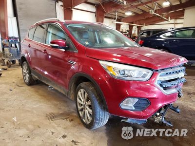 Czwarte zdjęcie samochodu z boku: 2017 FORD ESCAPE TITANIUM VIN:1FMCU0JD4HUB64080 - miniatura