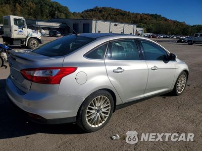 Trzecie zdjęcie samochodu z tyłu: 2014 FORD FOCUS TITANIUM VIN:1FADP3J24EL346854 - miniatura