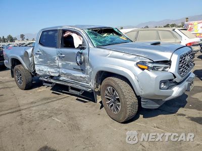 Czwarte zdjęcie samochodu z boku: 2022 TOYOTA TACOMA TRD SPORT VIN:3TMDZ5BN0NM127137 - miniatura