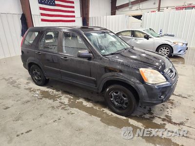 Czwarte zdjęcie samochodu z boku: 2006 HONDA CR-V LX VIN:JHLRD78546C043738 - miniatura