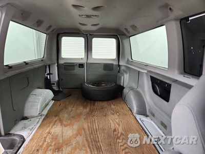 Zdjęcie 10 z 13 samochodu: 2014 FORD ECONOLINE E350 SUPER DUTY WAGON VIN:1FBNE3BL6EDA98018 - miniatura