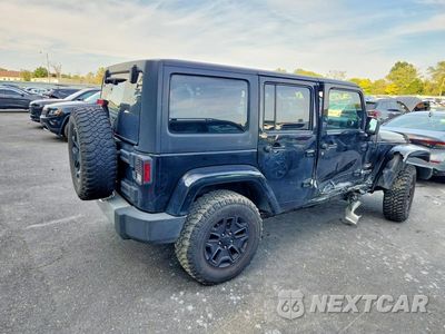 Trzecie zdjęcie samochodu z tyłu: 2012 JEEP WRANGLER UNLIMITED SAHARA VIN:1C4BJWEG5CL173448 - miniatura