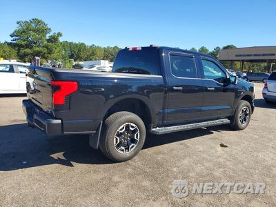 Trzecie zdjęcie samochodu z tyłu: 2023 FORD F150 LIGHTNING PRO VIN:1FTVW1EL2PWG52820 - miniatura