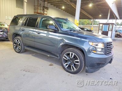 Czwarte zdjęcie samochodu z boku: 2020 CHEVROLET TAHOE K1500 LT VIN:1GNSKBKC1LR287846 - miniatura