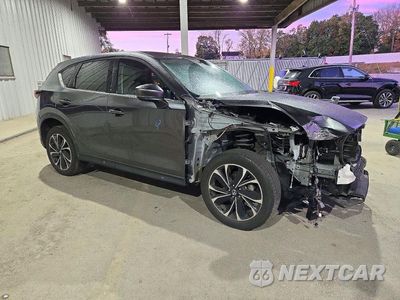 Czwarte zdjęcie samochodu z boku: 2022 MAZDA CX-5 PREMIUM PLUS VIN:JM3KFBEM2N0642135 - miniatura