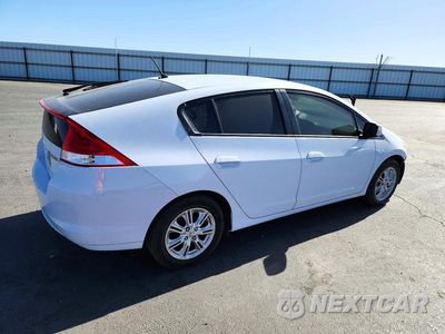 Trzecie zdjęcie samochodu z tyłu: 2010 HONDA INSIGHT EX VIN:JHMZE2H78AS008907 - miniatura
