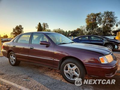 Czwarte zdjęcie samochodu z boku: 1999 TOYOTA AVALON XL VIN:4T1BF18B8XU306414 - miniatura