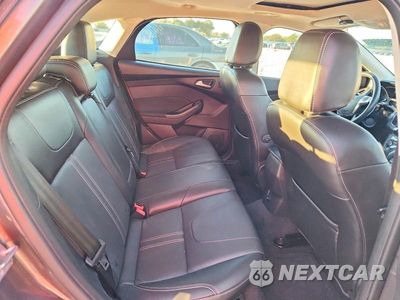 Zdjęcie 10 z 12 samochodu: 2014 FORD FOCUS TITANIUM VIN:1FADP3N22EL381001 - miniatura