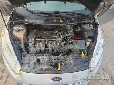 Zdjęcie 11 z 12 samochodu: 2014 FORD FIESTA TITANIUM VIN:3FADP4CJ3EM194879 - miniatura