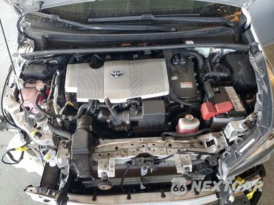 Zdjęcie 11 z 13 samochodu: 2021 TOYOTA PRIUS XLE VIN:JTDKAMFU1M3134849 - miniatura