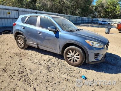 Czwarte zdjęcie samochodu z boku: 2016 MAZDA CX-5 SPORT VIN:JM3KE2BY6G0628963 - miniatura