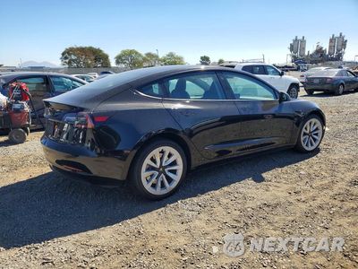 Trzecie zdjęcie samochodu z tyłu: 2023 TESLA MODEL 3 VIN:5YJ3E1EAXPF572923 - miniatura