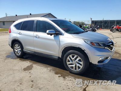 Czwarte zdjęcie samochodu z boku: 2015 HONDA CR-V EXL VIN:5J6RM4H7XFL012193 - miniatura