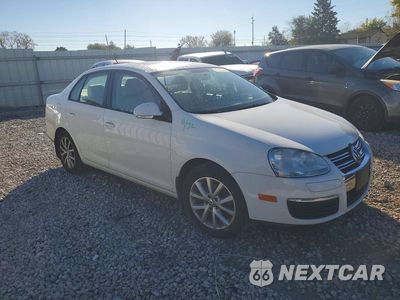 Czwarte zdjęcie samochodu z boku: 2010 VOLKSWAGEN JETTA SE VIN:3VWRX7AJ1AM125393 - miniatura