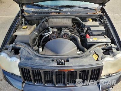 Zdjęcie 12 z 13 samochodu: 2010 JEEP GRAND CHEROKEE LAREDO VIN:1J4PR4GK1AC147294 - miniatura