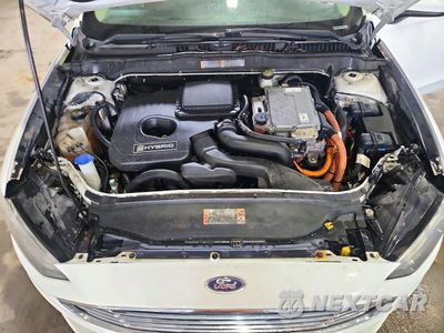 Zdjęcie 11 z 12 samochodu: 2018 FORD FUSION SE HYBRID VIN:3FA6P0LU9JR141404 - miniatura