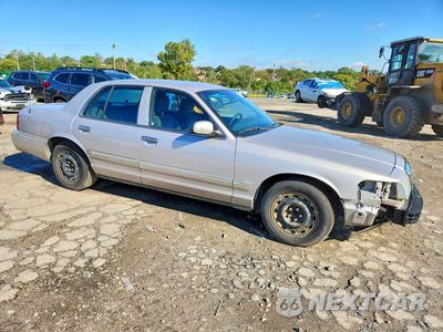 Czwarte zdjęcie samochodu z boku: 2005 MERCURY GRAND MARQUIS GS VIN:2MEFM74W95X614428 - miniatura