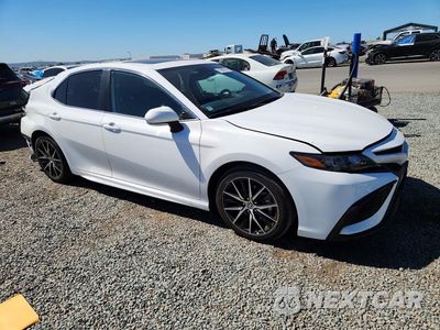 Czwarte zdjęcie samochodu z boku: 2023 TOYOTA CAMRY HYBRID SE VIN:4T1S31AK3PU058933 - miniatura