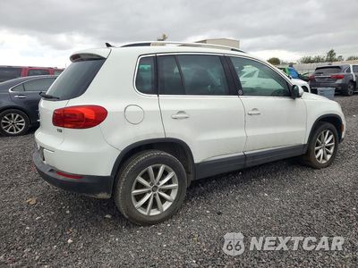 Trzecie zdjęcie samochodu z tyłu: 2017 VOLKSWAGEN TIGUAN WOLFSBURG VIN:WVGRV7AX1HW502324 - miniatura