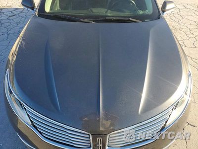Zdjęcie 11 z 12 samochodu: 2015 LINCOLN MKZ VIN:3LN6L2J94FR608196 - miniatura