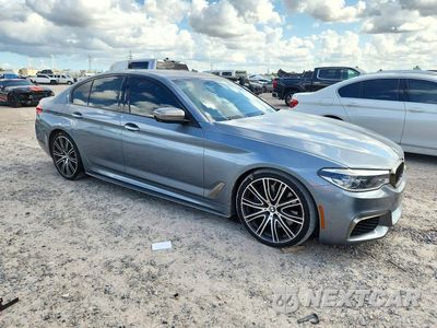 Czwarte zdjęcie samochodu z boku: 2018 BMW M550XI VIN:WBAJB9C57JB035177 - miniatura