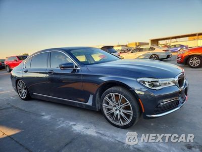 Czwarte zdjęcie samochodu z boku: 2017 BMW 750 I VIN:WBA7F0C39HGM21749 - miniatura
