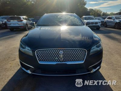 Piąte zdjęcie samochodu w środku: 2017 LINCOLN MKZ SELECT VIN:3LN6L5C94HR602254 - miniatura
