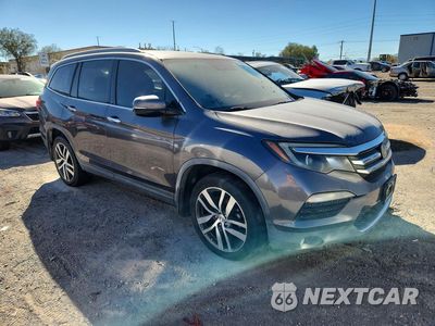 Czwarte zdjęcie samochodu z boku: 2017 HONDA PILOT ELITE VIN:5FNYF6H05HB054593 - miniatura