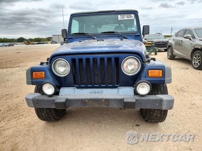 Piąte zdjęcie samochodu w środku: 2000 JEEP WRANGLER / TJ SPORT VIN:1J4FA49S5YP745357 - miniatura