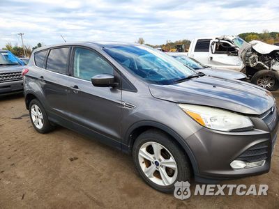 Czwarte zdjęcie samochodu z boku: 2014 FORD ESCAPE SE VIN:1FMCU9GX3EUC09768 - miniatura