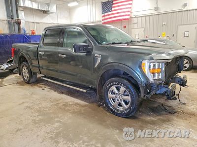 Czwarte zdjęcie samochodu z boku: 2021 FORD F150 SUPERCREW VIN:1FTFW1E53MKE78264 - miniatura