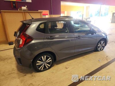 Trzecie zdjęcie samochodu z tyłu: 2015 HONDA FIT EX VIN:3HGGK5H86FM714593 - miniatura