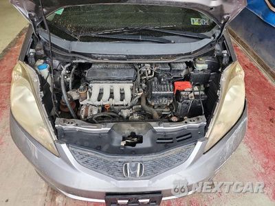 Zdjęcie 11 z 12 samochodu: 2009 HONDA FIT SPORT VIN:JHMGE88469S008674 - miniatura