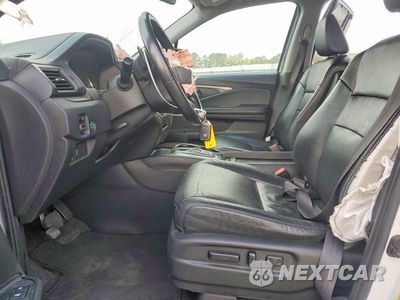 Zdjęcie 7 z 13 samochodu: 2021 HONDA PILOT SE VIN:5FNYF5H2XMB003077 - miniatura