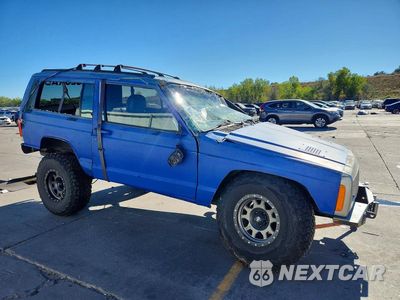 Czwarte zdjęcie samochodu z boku: 1997 JEEP CHEROKEE SPORT VIN:1J4FT67S8VL572879 - miniatura