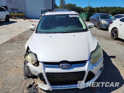 Piąte zdjęcie samochodu w środku: 2013 FORD FOCUS TITANIUM VIN:1FADP3J21DL116879 - miniatura