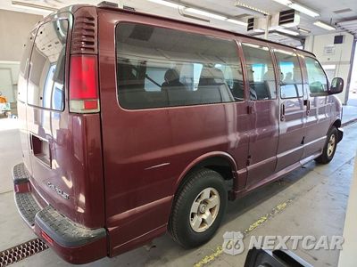Trzecie zdjęcie samochodu z tyłu: 2002 CHEVROLET EXPRESS G1500 VIN:1GNFG65RX21132736 - miniatura