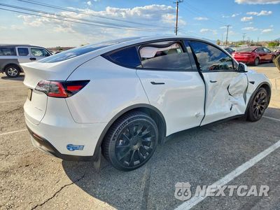 Trzecie zdjęcie samochodu z tyłu: 2021 TESLA MODEL Y VIN:5YJYGAEE8MF267791 - miniatura