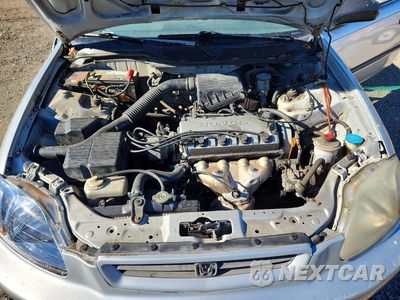 Zdjęcie 12 z 13 samochodu: 1998 HONDA CIVIC DX VIN:2HGEJ6444WH121655 - miniatura