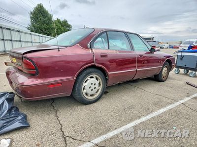 Trzecie zdjęcie samochodu z tyłu: 1999 OLDSMOBILE 88 BASE VIN:1G3HN52K1X4813530 - miniatura